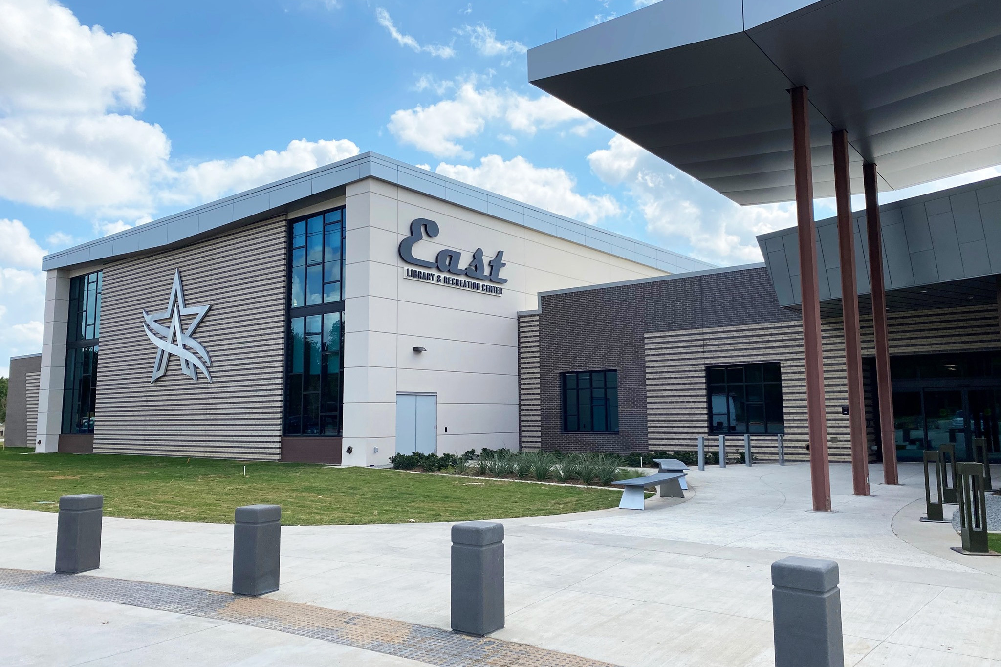Exterior of modern building with City of Arlington logo and
